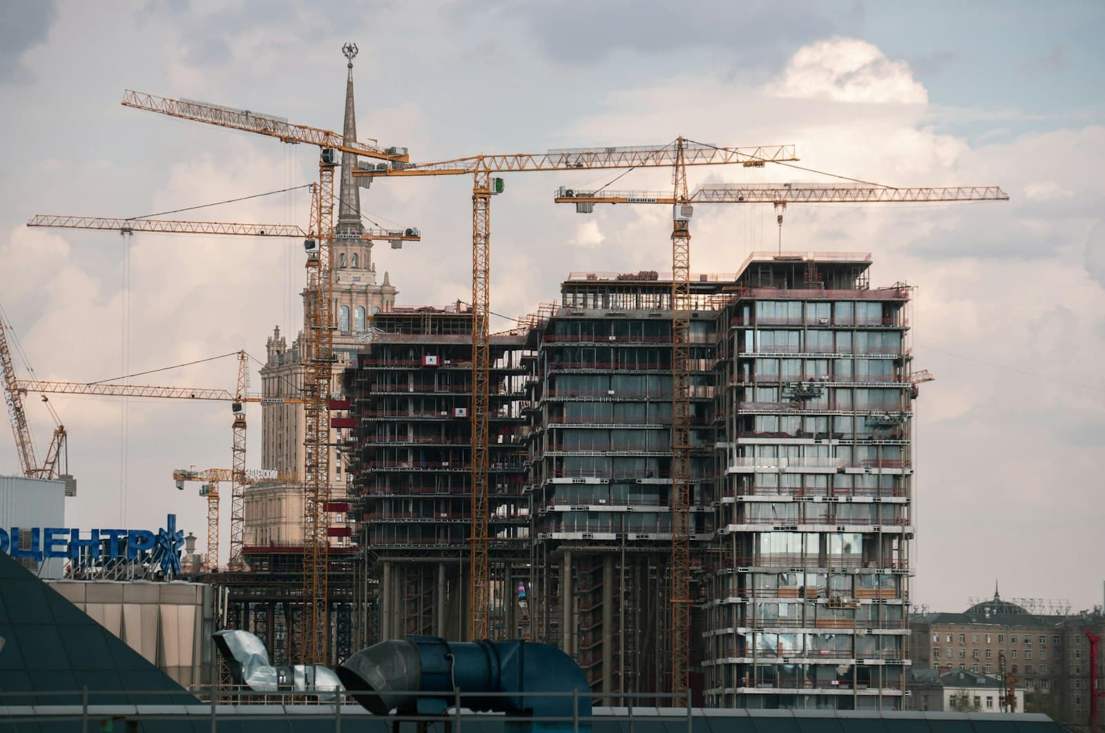 Residential towers under construction with cranes